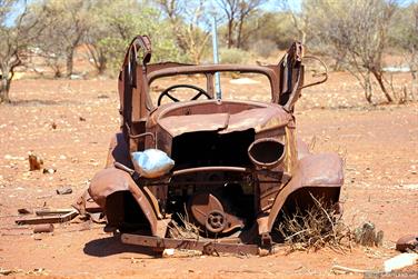 Rusty car on Kookynie-Malcolm Road, Western Australia